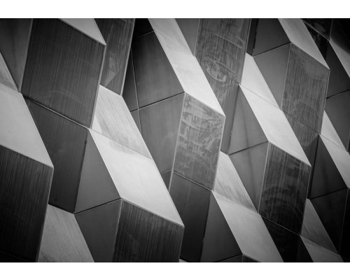 Fotobehang van een 3D-patroon met geometrische vormen en diepte.