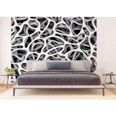 Een fotobehang van een zwart-wit abstract 3D kunstwerk in een slaapkamer.