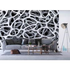 Een fotobehang van een zwart-wit abstract 3D kunstwerk in een woonkamer.
