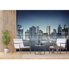 Een bedrijfsruimte met een fotobehang van het uitzicht in 3d op wolkenkrabbers in een verlichte stad.