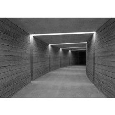 Fotobehang met een 3D-weergave van een betonnen tunnel die diepte en een futuristisch accent aan het interieur geeft.