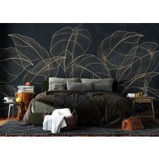 Een fotobehang met botanische bladeren en gouden accenten in de slaapkamer, waarin de weelderige plantmotieven en glinsterende goudlijnen een rustgevend en stijlvol effect geven.