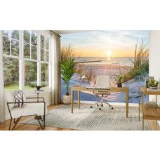 Fotobehang met strand, zee en duinen en een zonsondergang in een kantoor.