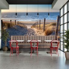 Fotobehang met een strandpad tussen de duinen in een restaurant met ontspannen kustbeleving.