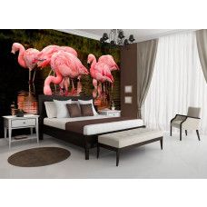 Een fotobehang met roze flamingo's voor de slaapkamer.