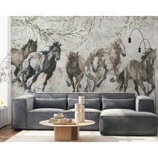 Fotobehang galopperende paarden in aquarelstijl in een woonkamer, dat zorgt voor warmte en een schilderachtige uitstraling.
