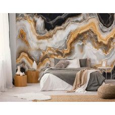 Fotobehang met vloeiende marmerlijnen in goud en zandkleur in een stijlvolle slaapkamer.