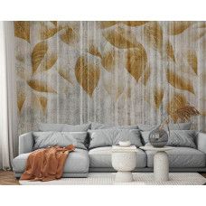 Een fotobehang van gouden bladeren op ruw beton in een woonkamer met vliesbehang.