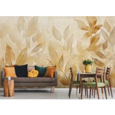 Fotobehang met aquarelgeschilderde herfstbladeren aan de muur van een sfeervolle woonkamer.