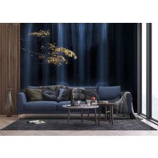 Een fotobehang van een herfsttak bij een waterval met rotsen en gouden tinten.