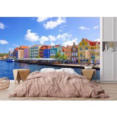 Fotobehang van Willemstad met kleurrijke huizen in een sfeervolle slaapkamer.