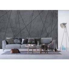 Een fotobehang van lijnen op beton, dat een moderne en industriėle uitstraling geeft aan een woonkamer.