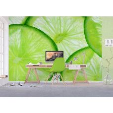 Een fotobehang van limoenschijven in felgroen, ideaal voor een frisse en levendige uitstraling in een kantoor.