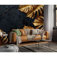 Fotobehang met luxueuze gouden bladeren op donkere textuur in de woonkamer.