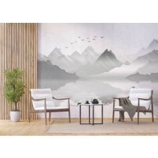 Een fotobehang van mistige bergen bij een meer in een bedrijfsruimte met Airtex-behang.