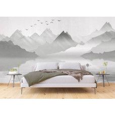 Een fotobehang van mistige bergen bij een meer in een slaapkamer.