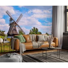 Fotobehang Molen in de Lente in een woonkamer met rustgevend Hollands landschap.