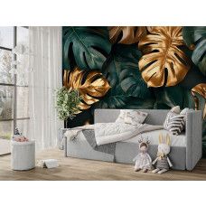 Fotobehang met botanisch monstera patroon in groen en goud toegepast in een tienerkamer.