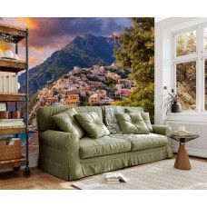 Fotobehang Positano bij zonsondergang in de huiskamer met kleurrijke Italiaanse kust.