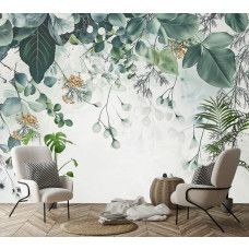 Fotobehang met botanische elementen in een harmonieuze compositie aan de muur van een sfeervolle woonkamer.