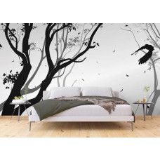 Een fotobehang van een silhouet van een bos met een vogel in de wind in een slaapkamer.