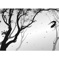 Een fotobehang van een silhouet van een bos met een vogel in de wind.