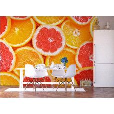 Een fotobehang van sinaasappels schijven fruit in een eetkamer.