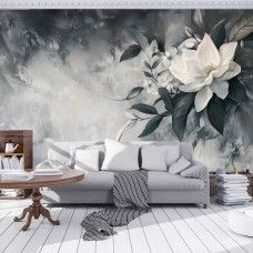 Fotobehang met een moderne bloemcompositie in wit en grijstinten in een rustige woonkamer.