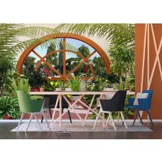 Een fotobehang van een wintertuin met planten en bloemen voor de eetkamer.