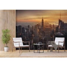 Fotobehang met een magische zonsondergang boven de wolkenkrabbers van de New York skyline in een bedrijfsruimte