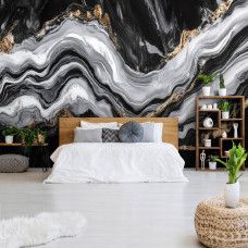 Fotobehang met elegante gouden aders in zwart marmer in een moderne slaapkamer.