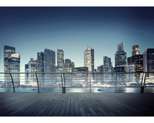 Fotobehang van het uitzicht in 3d op wolkenkrabbers in een verlichte stad.