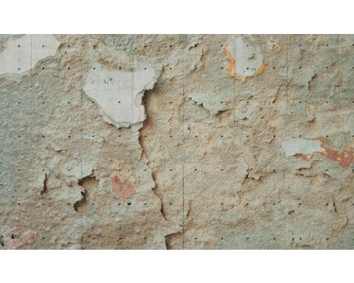 Fotobehang van een beschadigde betonnen muur, industrieel design.