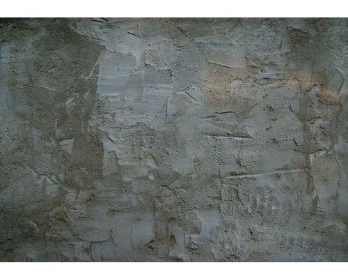 Betonnen muur met een industrieel effect op fotobehang.