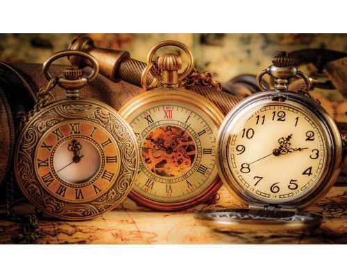 Fotobehang van gouden zakhorloges, met een klassieke en tijdloze uitstraling.