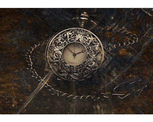 Fotobehang van een antiek zakhorloge, met een vintage en oude klokstijl.