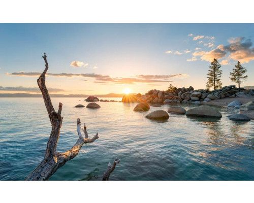 Zonsondergang landschap final light fotobehang, met een dramatische hemel.