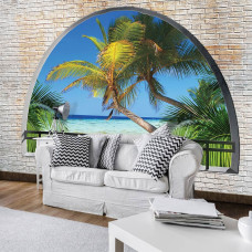 3D-fotobehang van tropische palmbomen en een exotisch strand, zichtbaar in een huiskamer.