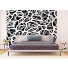 Een fotobehang van een zwart-wit abstract 3D kunstwerk in een slaapkamer.