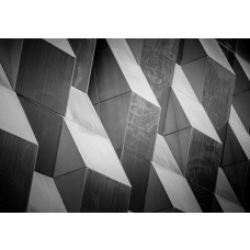 Fotobehang van een 3D-patroon met geometrische vormen en diepte.
