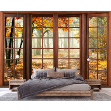 Een fotobehang met een herfstlandschap met vallende bladeren, ideaal voor een slaapkamer.