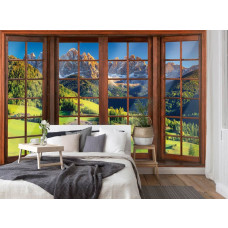 Een fotobehang met 3D-raamzicht op de Alpen in vliesbehangstijl voor een slaapkamer.
