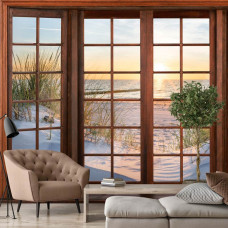 Een fotobehang met 3D-raamzicht op de duinen, strand en zee bij zonsondergang in een stijlvolle woonkamer.
