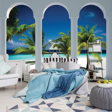Een fotobehang met Hawaii met een strand en palmbomen, perfect voor een slaapkamer.