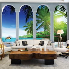 Een fotobehang met een tropisch strand met pilaren, passend in een huiskamer.