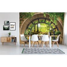 Een fotobehang met een zonnig bos bedrukt op vliesbehang, ideaal voor een keuken.
