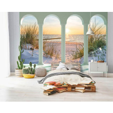 Een fotobehang met 3D-zicht op de duinen, strand en zee in een kleurrijke kinderkamer.