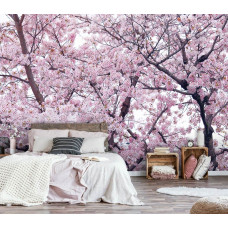 Een fotobehang met appelbloesem en bloemen te zien in de slaapkamer.