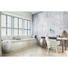 Een fotobehang van een betonnen muur in industriėle stijl voor de woonkamer.