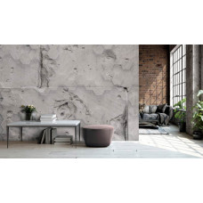 Een fotobehang met betonnen zeshoeken voor een industriėle uitstraling in de woonkamer.